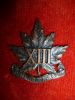 MM79, 13th REGIMENT COLLAR BADGE(S)